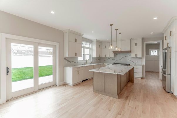 Interior, Kitchen, Marble Walls, Pendant Lights, Recessed Lighting, Wood Texture Flooring