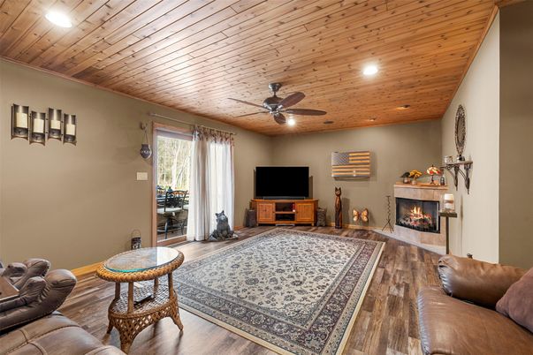 Fireplace, Interior, Living room, Recessed Lighting, Wooden Ceilings, Wood Texture Flooring