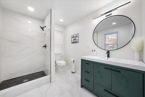 Bathroom, Dual Sink Vanities, Glass Shower, Interior, Marble, Marble Walls, Recessed Lighting