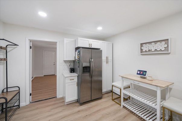 Interior, Kitchen, Recessed Lighting, Stainless Steel Appliances, Wood Texture Flooring