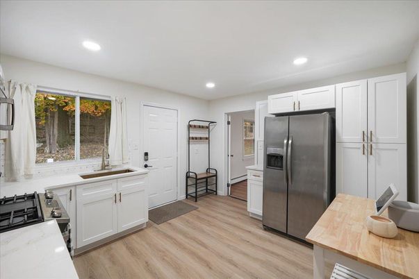 Interior, Kitchen, Recessed Lighting, Stainless Steel Appliances, Wood Texture Flooring