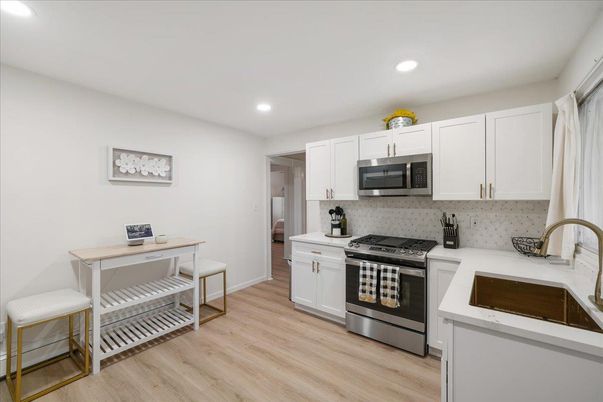 Interior, Kitchen, Recessed Lighting, Stainless Steel Appliances, Wood Texture Flooring