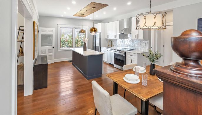 Dining room, Interior, Kitchen, Pendant Lights, Recessed Lighting, Stainless Steel Appliances, Wood Texture Flooring
