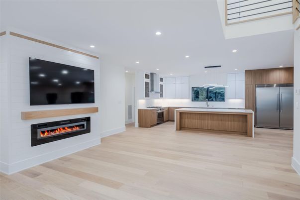 Fireplace, Interior, Kitchen, Recessed Lighting, Stainless Steel Appliances, Wood Texture Flooring