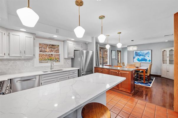 Dining room, Interior, Kitchen, Pendant Lights, Recessed Lighting, Stainless Steel Appliances, Wood Texture Flooring