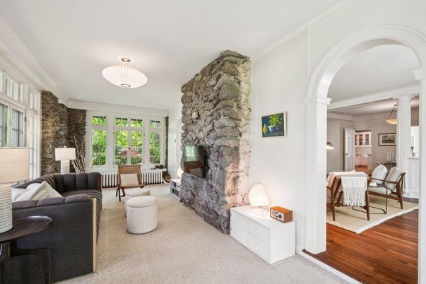 Dining room, Fireplace, Interior, Living room, Pendant Lights, Stone Walls, Wood Texture Flooring