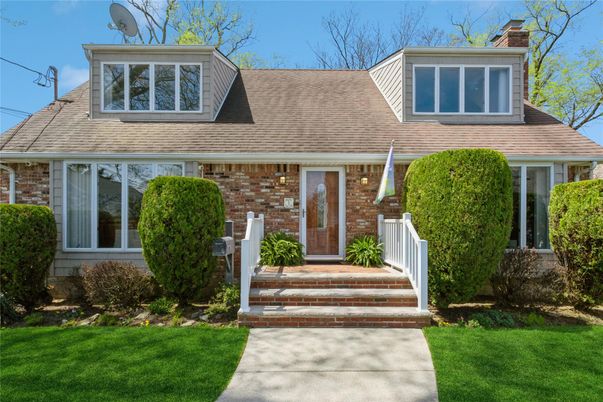 Exterior, Facade, Brick Facade, Cape Cod