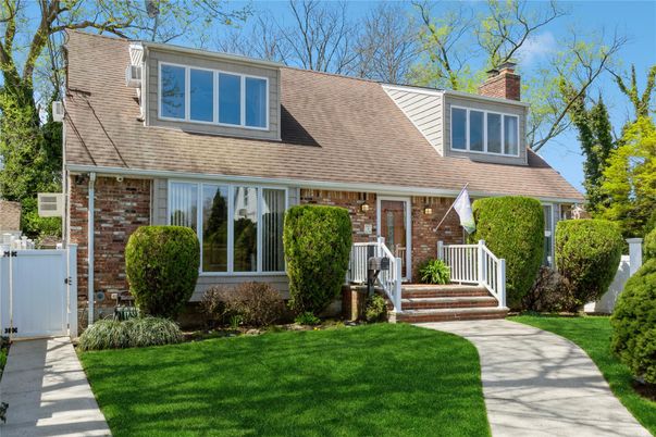 Exterior, Facade, Brick Facade, Cape Cod