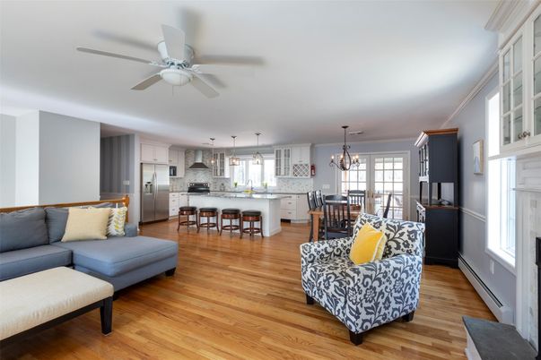 Chandelier, Dining room, Interior, Kitchen, Living room, Pendant Lights, Stainless Steel Appliances, Wood Texture Flooring