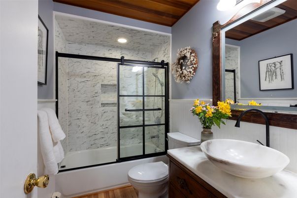 Bathroom, Glass Shower, Interior, Marble Walls, Recessed Lighting, Wood Texture Flooring