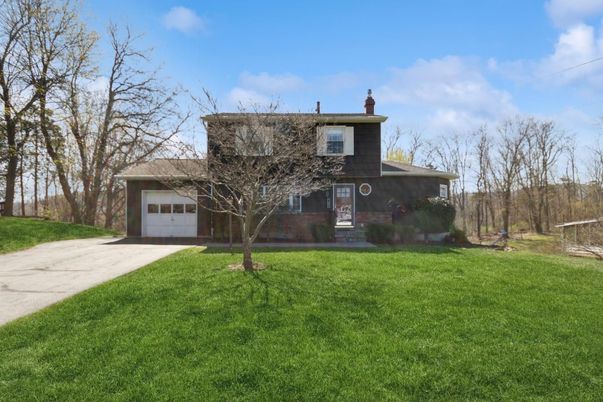 Attached, Backyard, Exterior, Facade, None