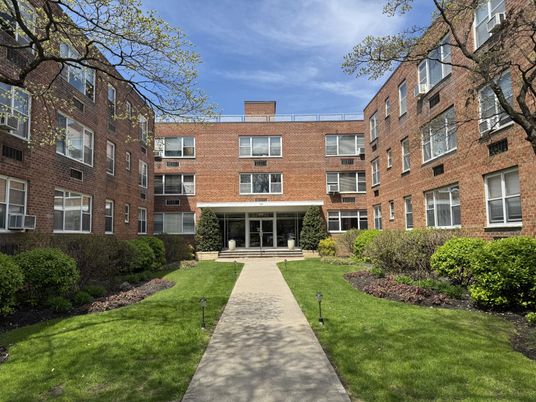 Exterior, Facade, Brick Facade, Condo Building