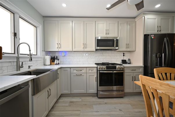 Interior, Kitchen, Recessed Lighting, Stainless Steel Appliances, Wood Texture Flooring