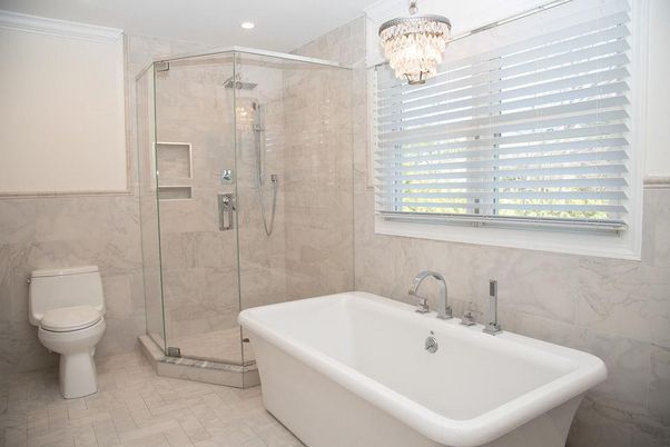 Bathroom, Chandelier, Free Standing Baths, Glass Shower, Interior, Marble Walls, Recessed Lighting