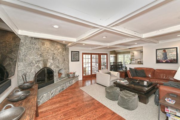 Fireplace, Interior, Living room, Recessed Lighting, Stone Walls, Wood Texture Flooring