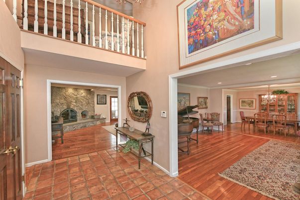 Chandelier, Dining room, Fireplace, Interior, Piano, Recessed Lighting, Wood Texture Flooring