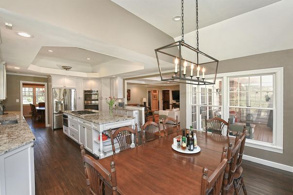 Dining room, Interior, Kitchen, Pendant Lights, Recessed Lighting, Stainless Steel Appliances, Wood Texture Flooring