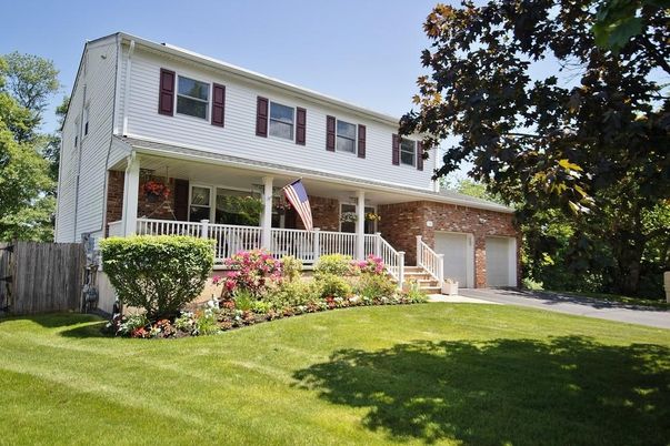 Attached, Exterior, Facade, Brick Facade, American Foursquare