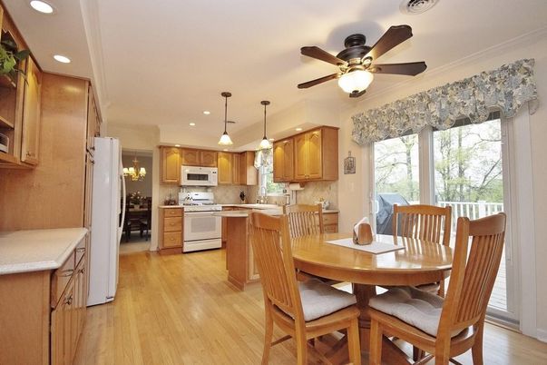 Dining room, Interior, Kitchen, Pendant Lights, Recessed Lighting, Stainless Steel Appliances, Wood Texture Flooring