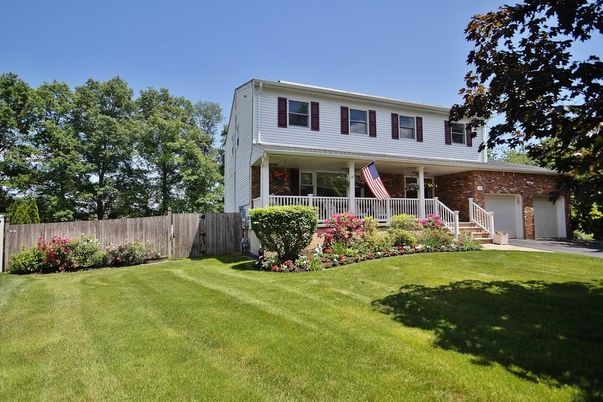 Attached, Backyard, Exterior, Facade, Brick Facade, Raised Ranch