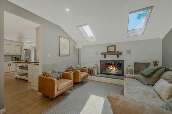 Fireplace, Interior, Kitchen, Living room, Recessed Lighting, Stone Walls, Wood Texture Flooring
