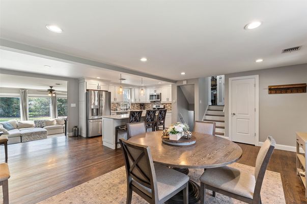 Dining room, Interior, Kitchen, Living room, Pendant Lights, Recessed Lighting, Stainless Steel Appliances, Wood Texture Flooring