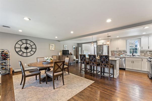 Dining room, Interior, Kitchen, Pendant Lights, Recessed Lighting, Stainless Steel Appliances, Wood Texture Flooring