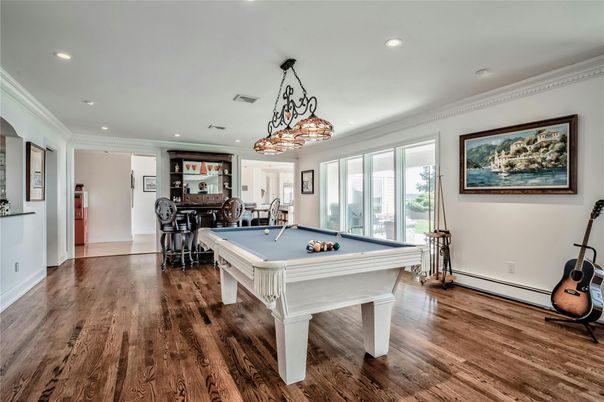 Billiard Table, Chandelier, Game Room, Interior, Pendant Lights, Recessed Lighting, Wood Texture Flooring
