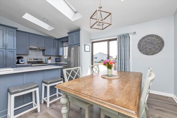 Dining room, Interior, Kitchen, Pendant Lights, Stainless Steel Appliances, Wood Texture Flooring
