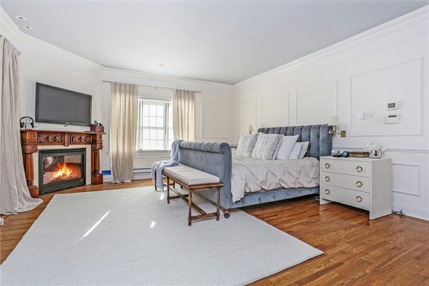 Bedroom, Fireplace, Interior, Recessed Lighting, Wood Texture Flooring