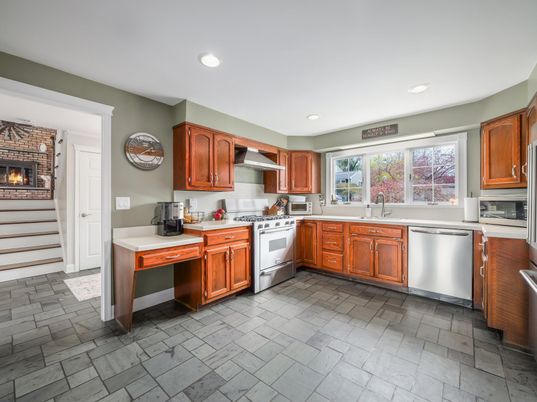 Fireplace, Interior, Kitchen, Recessed Lighting, Stainless Steel Appliances, Stone Walls