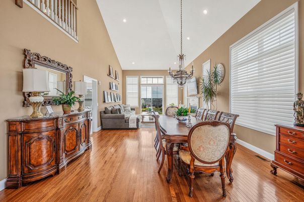 Chandelier, Dining room, Fireplace, Interior, Living room, Pendant Lights, Recessed Lighting, Wood Texture Flooring