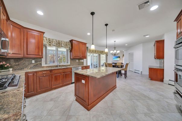 Chandelier, Dining room, Interior, Kitchen, Pendant Lights, Recessed Lighting, Stainless Steel Appliances