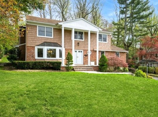 Exterior, Facade, Brick Facade, Raised Ranch