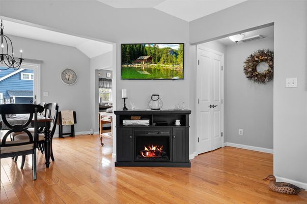 Chandelier, Dining room, Fireplace, Interior, Wood Texture Flooring