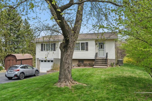 Attached, Exterior, Facade, Raised Ranch