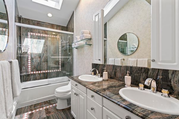 Bathroom, Dual Sink Vanities, Glass Shower, Interior, Recessed Lighting, Tile Countertops