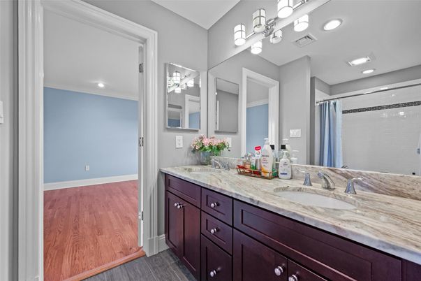 Bathroom, Dual Sink Vanities, Interior, Recessed Lighting, Wood Texture Flooring