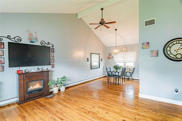 Dining room, Fireplace, Interior, Pendant Lights, Wood Texture Flooring