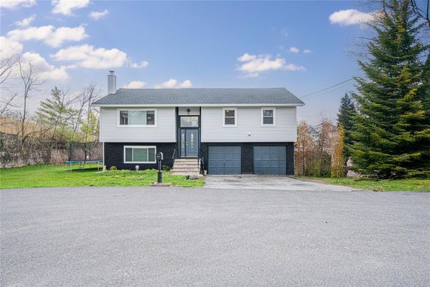Attached, Exterior, Facade, Brick Facade, Raised Ranch