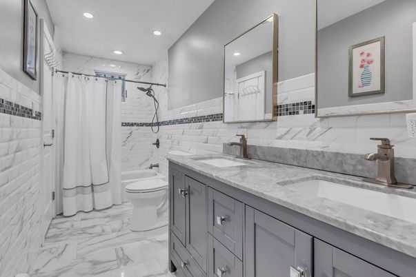 Bathroom, Dual Sink Vanities, Interior, Marble, Marble Walls, Recessed Lighting