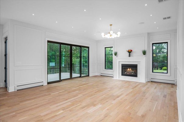 Chandelier, Empty room, Fireplace, Interior, Pendant Lights, Recessed Lighting, Wood Texture Flooring