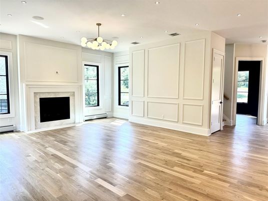 Chandelier, Empty room, Fireplace, Interior, Recessed Lighting, Wood Texture Flooring