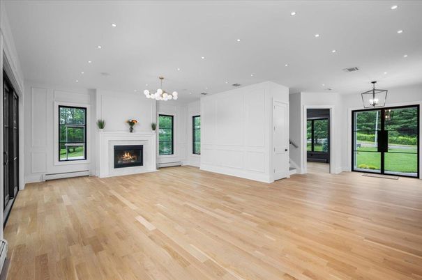 Empty room, Fireplace, Interior, Pendant Lights, Recessed Lighting, Wood Texture Flooring