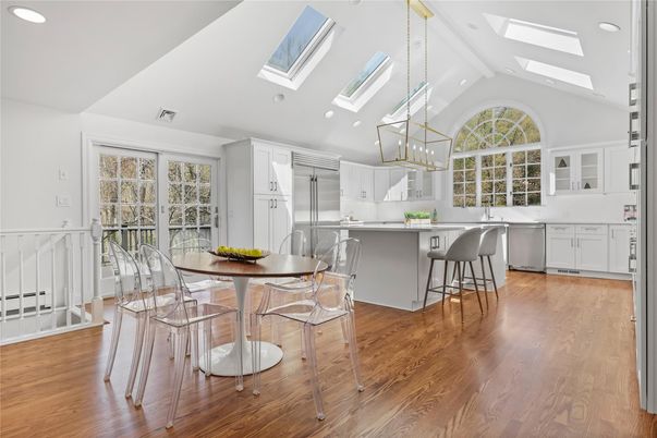 Dining room, Interior, Kitchen, Pendant Lights, Recessed Lighting, Stainless Steel Appliances, Wood Texture Flooring