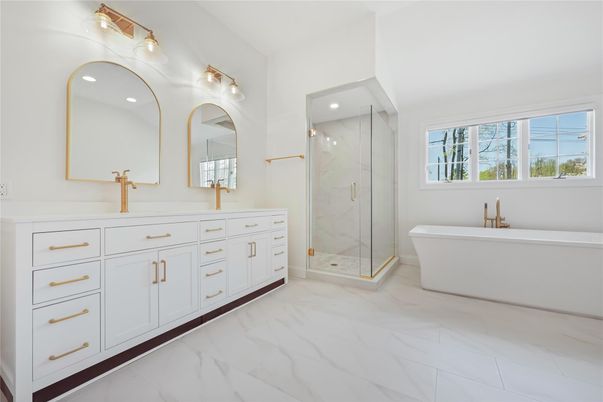 Bathroom, Dual Sink Vanities, Free Standing Baths, Glass Shower, Interior, Marble, Marble Walls, Recessed Lighting