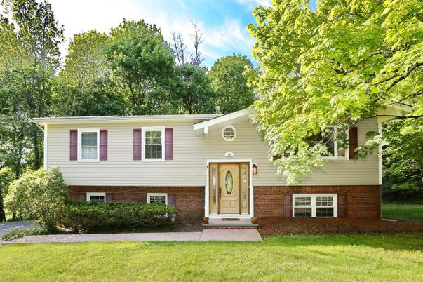 Exterior, Facade, Brick Facade, Raised Ranch