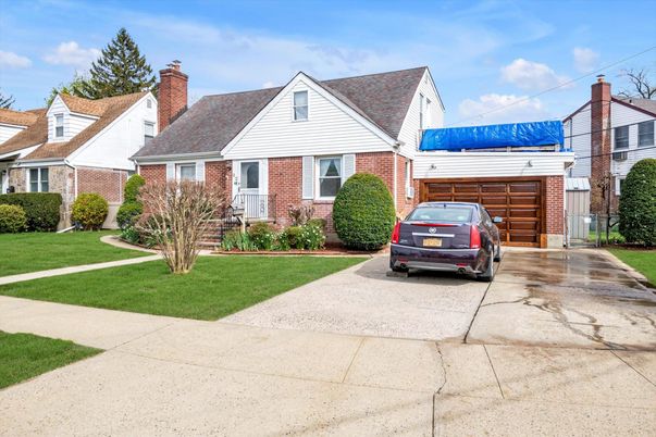 Attached, Exterior, Facade, Brick Facade, Cape Cod
