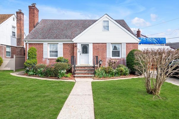 Exterior, Facade, Brick Facade, Cape Cod