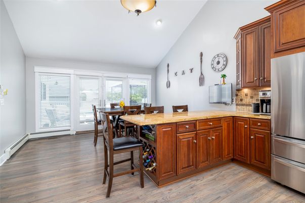 Dining room, Interior, Kitchen, Recessed Lighting, Stainless Steel Appliances, Wood Texture Flooring